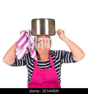 Funny elder woman with pan on the head isolated over white background Stock Photo