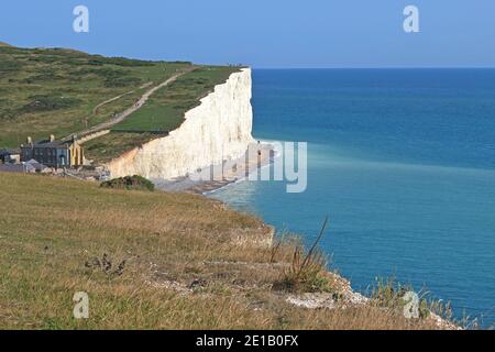 A view along the Seven Sisters to Birling Gap that lies between Eastbourne and Seaford on England's south coast. These chalk cliffs suffer erosion. Stock Photo