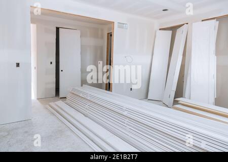 Wood timber construction material stock in joinery on the construction wooden stacker doors a wait installation Stock Photo