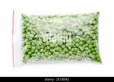 Frozen green peas in plastic bag on white background Stock Photo