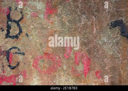 Abstract colour background wall texture with etched graphic patterns. Stock Photo