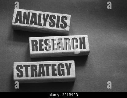 Analysis research strategy words on wooden blocks with copyspace. Market research in Business Concept. Stock Photo