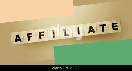 AFFILIATE word written on wooden blocks. Refferals marketing business concept. Stock Photo