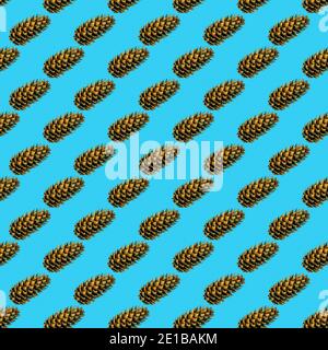 Seamless Christmas pattern of fir cones on a blue background. Printing on paper, fabric, Wallpaper. Square pattern Stock Photo