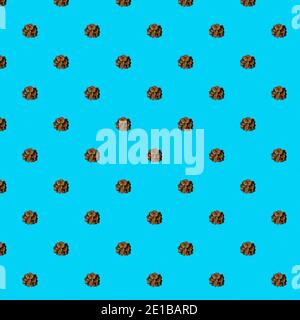 Seamless pattern of pine cones on a blue background. Print, design Stock Photo