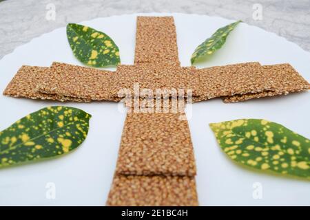 Til sakri or Tilgul an Indian traditional popular sweet made out of Sesame seeds and jaggery. Famous Sankranti festival dessert arranged decorated wit Stock Photo