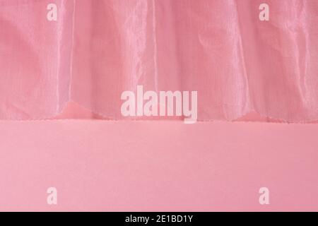 Pink crumpled organza fabric. Abstract background. Stock Photo