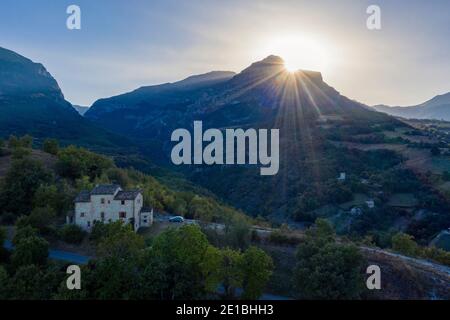 Typical Italian villa on the hills near Amandola, Marche region, Italy. Scenic countryside landscape during a beautiful sunset Stock Photo