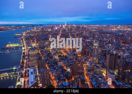 USA, New York City: overview of Manhattan lit up at night Stock Photo