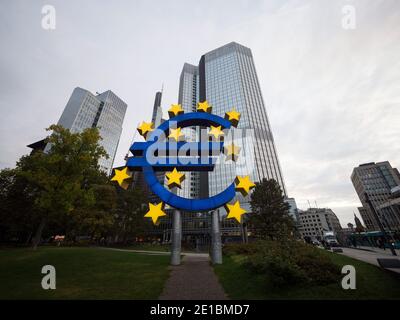 Euro sculpture sign money currency symbol in front of Eurotower former seat of European Central Bank on Willy Brandt Platz in the Bankenviertel Frankf Stock Photo