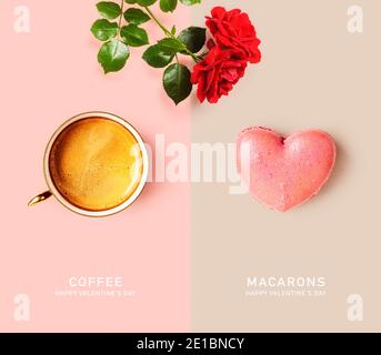 Coffee cup, red rose and macarons heart shaped creative layout on color background. Valentines day concept and greeting card. Food and flower composit Stock Photo
