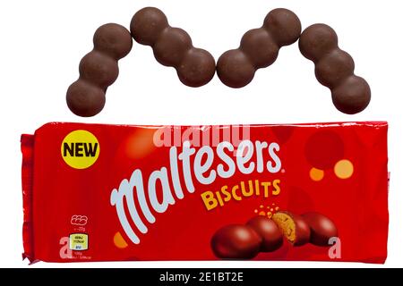 Packet of new Maltesers Biscuits opened to show contents set on white background - biscuits containing crisp honeycomb pieces coated in milk chocolate Stock Photo