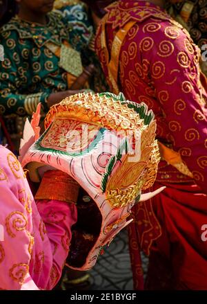 performer with traditional Lakhon Khol mask dance ceremony costume at Wat Svay Andet UNESCO Intangible Cultural Heritage site in Kandal province Cambo Stock Photo