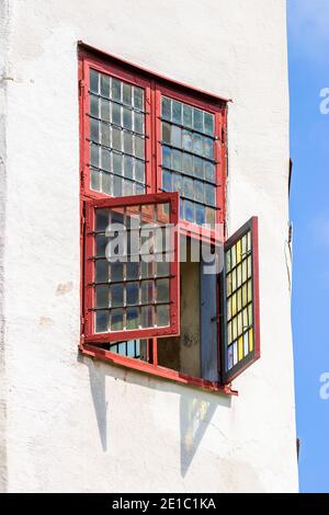 Open windows on a castle wall Stock Photo