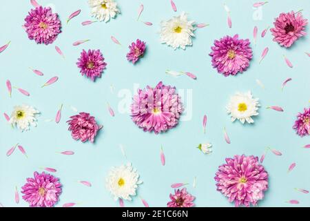 Flowers composition. Pattern made of colorful flowers on pastel blue background. Spring, easter, summer concept. Flat lay, top view. Stock Photo