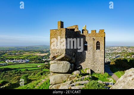 carn brea castle overlooking the town of redruth in cornwall england Stock Photo