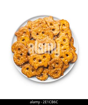 Salted mini flat pretzels isolated on white background. Stock Photo
