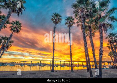 Winter morning sunrise in Coronado, California, USA. San Diego Harbor and the Coronado Bridge in the background. Stock Photo