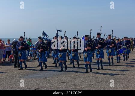 One of the several Pipe and Drum Scottish Marching bands displaying at ArbroathÕs Festival of HeroÕs event at Victoria Park. Stock Photo