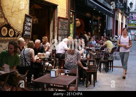 Typical Spanish tapas restaurant on Calle de Cadiz. Dishes, paella, good atmosphere, terrace. Stock Photo