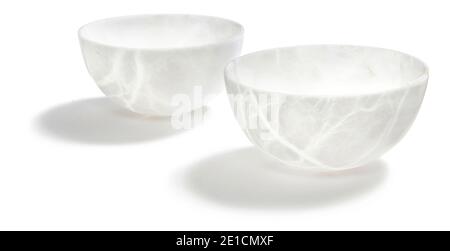 Two alabaster bowls designed by Anna Rabinowicz photographed on a white background Stock Photo