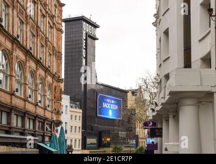 Exterior view of a closed Odeon West End cinema on Leicester Square during the third coronavirus lockdown in London. Stock Photo