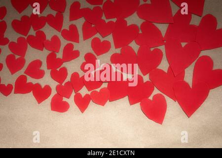 Various romantic red hearts, symbol for Valentine's day, with paper plain background, romantic Valentine design. copy space Stock Photo
