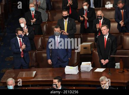 Washington, United States. 06th Jan, 2021. Rep. Paul Gosar, R-AZ, (L) and Sen. Ted Cruz, R-TX, (C) object too certification of Arizona's Electoral College votes during a joint session of Congtess the U.S. Capitol in Washington, DC on Wednesday, January 6, 2021. Congress split into two sessions to debate the issue. Photo by Pat Benic/UPI Credit: UPI/Alamy Live News