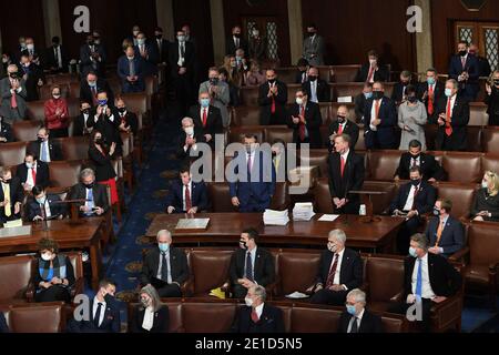 Washington, United States. 06th Jan, 2021. Some members of Congress applaud as Rep. Paul Gosar, R-AZ, (R-C) and Sen. Ted Cruz, R-TX, (C) object too certification of Arizona's Electoral College votes during a joint session of Congtess the U.S. Capitol in Washington, DC on Wednesday, January 6, 2021. Congress split into two sessions to debate the issueas demonstrator stormed the building. Photo by Pat Benic/UPI Credit: UPI/Alamy Live News
