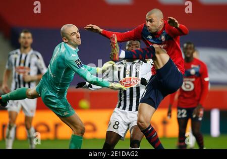 Soccer Football - Ligue 1 - Lille v Angers - Stade Pierre-Mauroy, Lille, France - January 6, 2021 Lille's Burak Yilmaz shoots at goal REUTERS/Pascal Rossignol