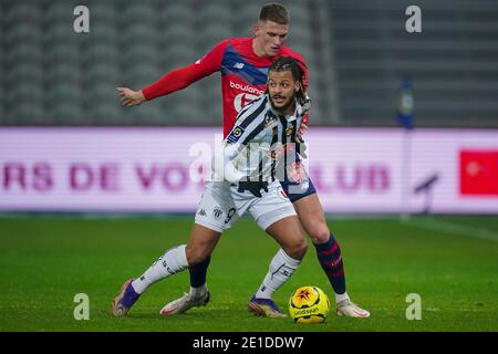LILLE, FRANCE - JANUARY 6: Lois Diony of Angers SCO, Sven Botman of Lille OSC during the Ligue 1 match between Lille OSC and Angers SCO at Stade Pierre Mauroy on January 6, 2021 in Lille, France (Photo by Jeroen Meuwsen/BSR Agency/Alamy Live News)*** Local Caption *** Lois Diony, Sven Botman