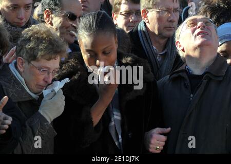 Rakia Kouka, Antoine de Leocour fiancee, Mrs and Mr de leocour attend a ceremony to pay tribute to Antoine de Leocour and Vincent Delory, killed last week in Niger, on January 15, 2011. Photo by Christophe Guibbaud/ABACAPRESS.COM Stock Photo