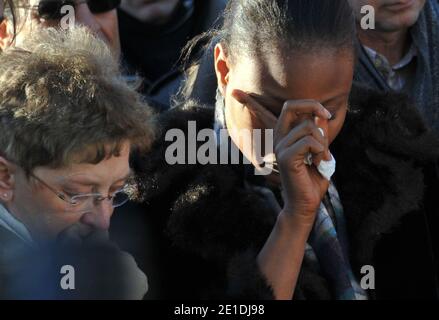 Rakia Kouka, Antoine de Leocour fiancee and Mrs De leocour attend a ceremony to pay tribute to Antoine de Leocour and Vincent Delory, killed last week in Niger, on January 15, 2011. Photo by Christophe Guibbaud/ABACAPRESS.COM Stock Photo