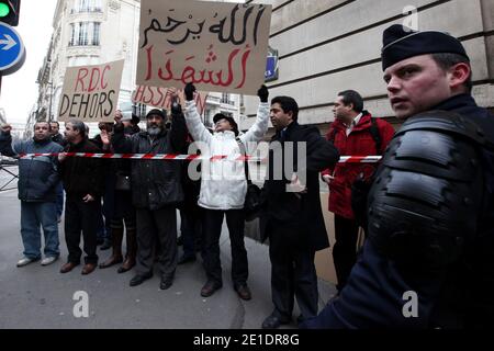Gathering in front of the consulate of Tunisia of the Collective of Solidarity with the Fights of the Inhabitants of Sidi Bouzid in Tunisia to accompany militants who claim their passports in Paris, France, on January 21, 2011. Photo by Stephane Lemouton/ABACAPRESS.COM Stock Photo