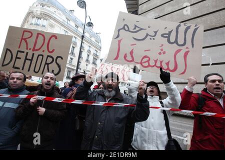 Gathering in front of the consulate of Tunisia of the Collective of Solidarity with the Fights of the Inhabitants of Sidi Bouzid in Tunisia to accompany militants who claim their passports in Paris, France, on January 21, 2011. Photo by Stephane Lemouton/ABACAPRESS.COM Stock Photo