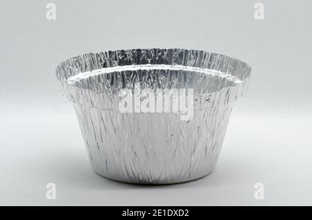 Disposable aluminium packaging on a gray background. High quality photo Stock Photo