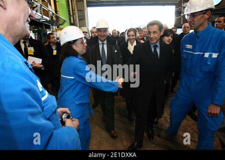 French president Nicolas Sarkozy and Nathalie Kosciusko-Morizet visit the STX shipyard and meet employees in Saint-Nazaire, western France on January 25, 2011. Nicolas Sarkozy is on an one day visit at the STX shipyard to sign a contract between France and Russia on ship building. Photo by Ludovic/Pool/ABACAPRESS.COM Stock Photo