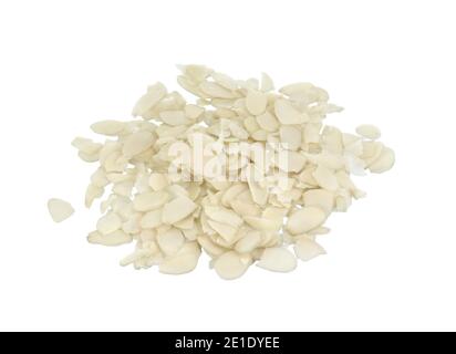 Pile of peeled flaked almonds isolated on white. Blanched almonds flakes on white. Stock Photo