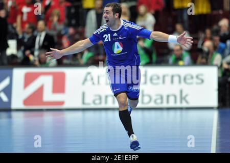 France's Michael Guigou celebrates after winning the 2011 World Championship at Malmo Arena in Malmo, Sweden on January 30, 2011. France defeats Denmark 37-35. Photo by Nicolas Gouhier/ABACAPRESS.COM Stock Photo