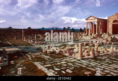 The archaeological site of Sbeitla in north-central Tunisia. Roman ruins of Sufetula. The Forum, one of the best preserved in the world and Three Temples. Archival scan from a slide. April 1976. Stock Photo