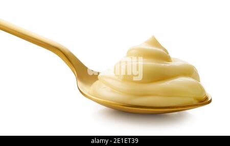 mayonnaise in golden spoon isolated on white background Stock Photo