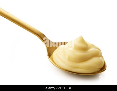 mayonnaise in golden spoon isolated on white background Stock Photo