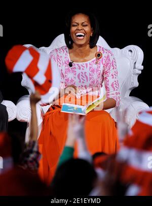 First Lady Michelle Obama reads a 'Cat in the Hat' story during the kick off of the 14th annual national Read Across America Day that celebrate Dr. Seuss's 107th birthday at the Library of Congress March 2, 2011 in Washington D.C. Photo by Olivier Douliery/ABACAPRESS.COM Stock Photo