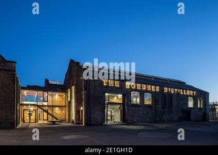 Exterior view of The Borders Distillery, Hawick, Scotland, UK at night. Winner of Architects Journal Retrofit Award 2018 and Civic Trust Award 2019 Stock Photo
