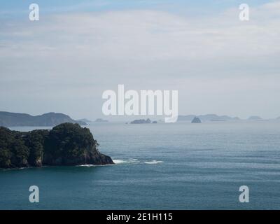 Panorama view of rocky island cliffs near Hahei Beach pacific ocean in Mercury Bay Coromandel Peninsula Waikato North Island New Zealand Oceania Stock Photo