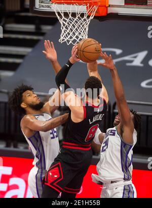 Sacramento, CA, USA. 6th Jan, 2021. Sacramento Kings forward Marvin Bagley III (35) and Sacramento Kings guard Buddy Hield (24) battle Chicago Bulls guard Zach LaVine (8) during a game at the Golden 1 Center on Wednesday, Jan 6, 2021 in Sacramento. Credit: Paul Kitagaki Jr./ZUMA Wire/Alamy Live News Stock Photo