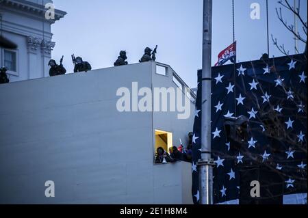 Washington Dc, United States. 06th Jan, 2021. DC Police armed with tear gas guns patrol the US Capitol building during the Pro-Trump rally.Pro-trump supporters stormed the United States Capitol after the loss of US President Donald Trump at the election. Credit: SOPA Images Limited/Alamy Live News Stock Photo