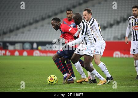 Jonathan Ikone 10 LOSC and defender Angers during the French championship Ligue 1 football match between Lille OSC and Angers SCO on January 6, 2021 at Pierre Mauroy stadium in Villeneuve-d'Ascq near Lille, France - Photo Laurent Sanson / LS Medianord / DPPI / LM