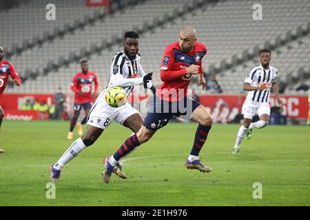 Burak Yilmaz 17 LOSC and Ismael TRAORE 8 ANgers during the French championship Ligue 1 football match between Lille OSC and An / LM