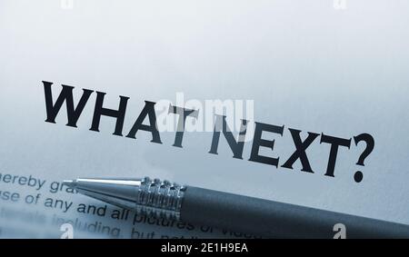 What's next words printed on page and pen besides. Future plan concept. Stock Photo